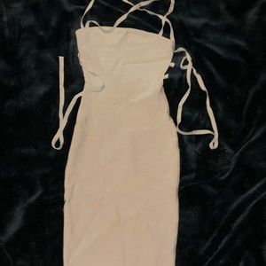 Nude open back super stretchy sleeveless dress. Thick high quality material.